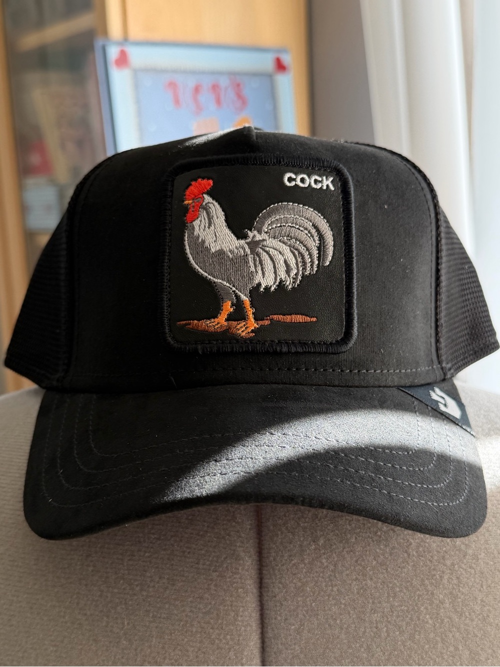 Goorin Bros Black Trucker Hat with Rooster Patch